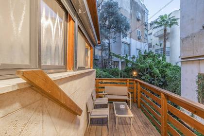 Green balcony in a furnished rental apartment in Haifa